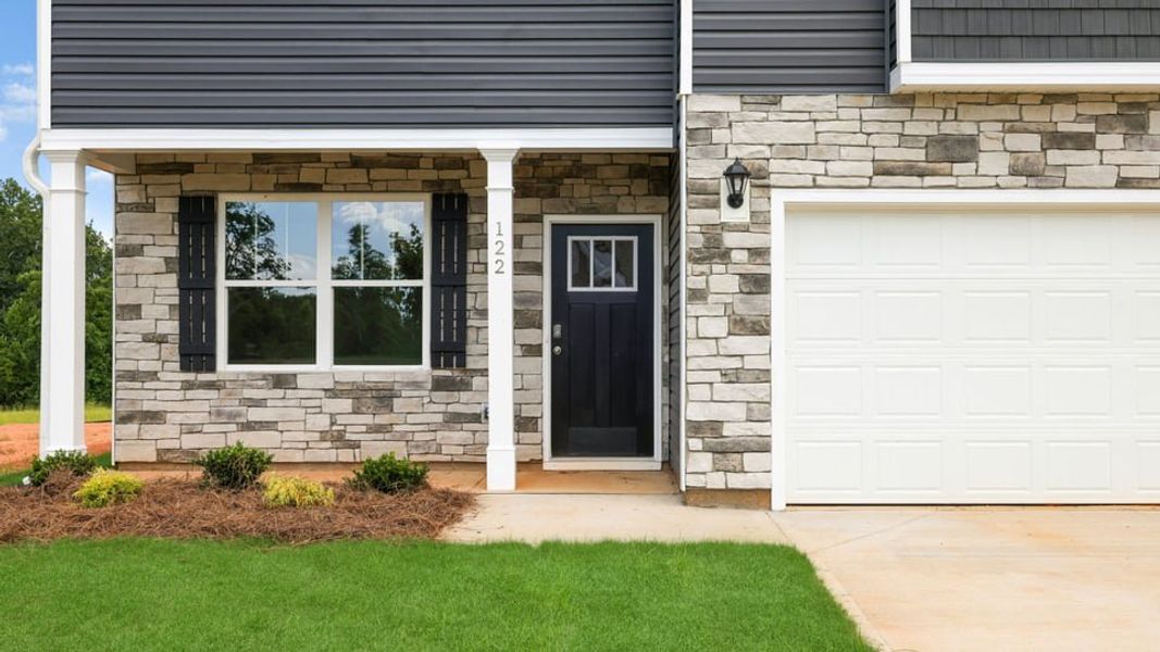 Exterior details and patio area of a home in Waverly Station, Greenwood (Image 3). Exterior details and patio area of a home in Waverly Station, Greenwood (Image 3).