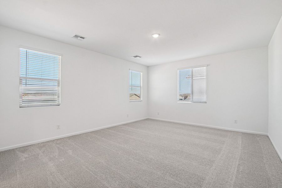 Primary suite. Finishes and options may vary by community