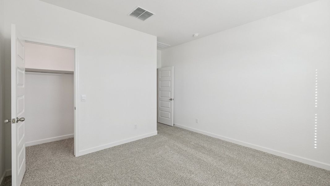 Spacious, unfurnished interior of a new home in Desert Moon Estates, Buckeye (Image 29).