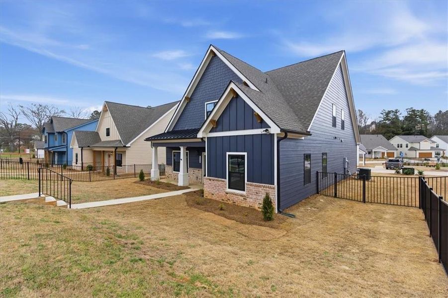 Exterior details and patio area of a home in Ferguson Corners, Emerson (Image 26).