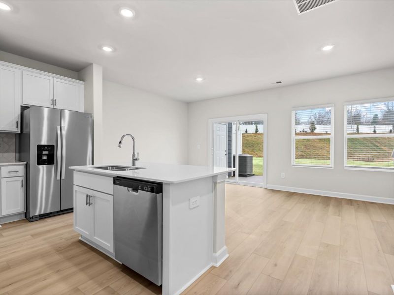 Furnished interior view inside a new home in Crossing at Abner Creek Townes, Greer (Image 5). Furnished interior view inside a new home in Crossing at Abner Creek Townes, Greer (Image 5).