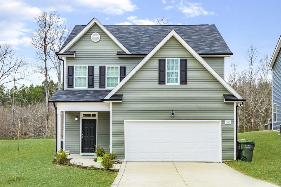 Representative exterior photo of a completed home built from the Palmer by RiverWILD Homes in Riverwood Ranch, Clayton, NC (Image 18).