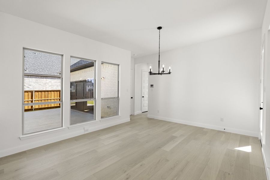 Representative unfurnished interior of a home built from the Hadley by Windsor Homes in Winding Creek, Rockwall (Image 21).