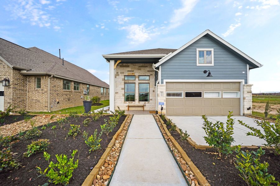 Representative exterior photo of a completed home built from the Tanlay – Chateau Collection by Chesmar Homes in Jordan Ranch, Pattison, TX (Image 11). Representative exterior photo of a completed home built from the Tanlay – Chateau Collection by Chesmar Homes in Jordan Ranch, Pattison, TX (Image 11).