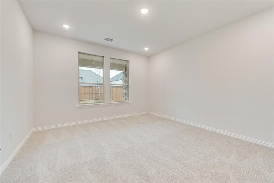 Spacious, unfurnished interior of a new home in Spiritas Ranch, Little Elm (Image 28).
