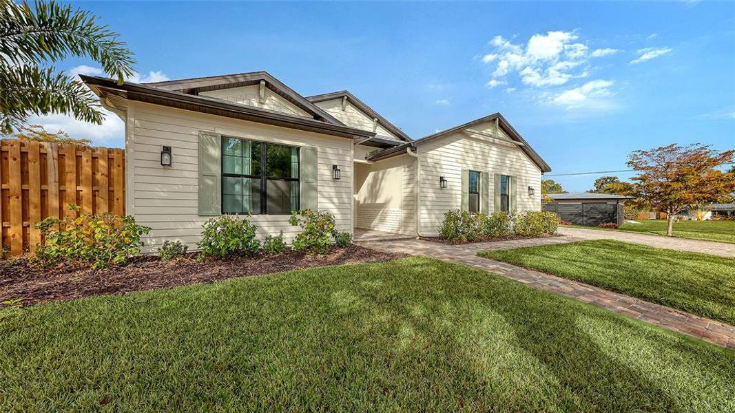Exterior details and patio area of a home in , Sarasota (Image 28).