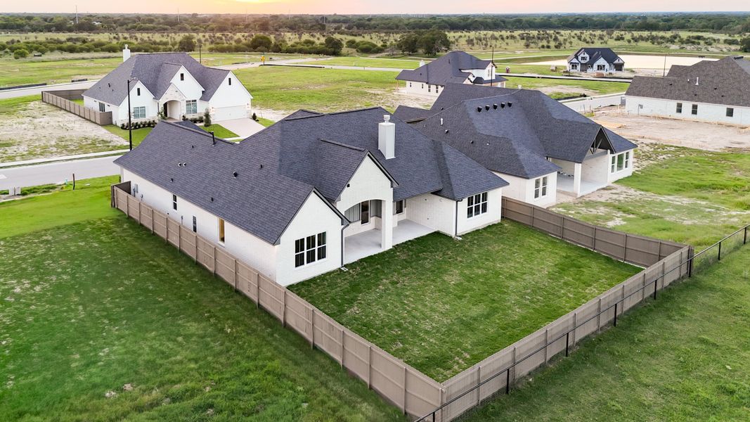 Front exterior of a new home in Stella Ranch, Bryan, TX, highlighting curb appeal (Image 30).