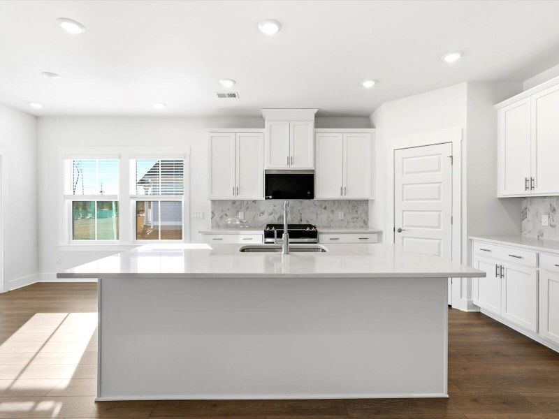 Furnished interior view inside a new home in The Coves at Lakes of Cane Bay, Summerville (Image 4).