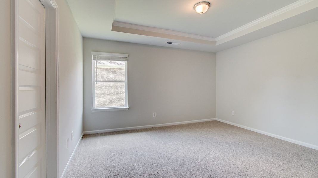 Furnished interior view inside a new home in Westwind Estates, Hampton (Image 24).