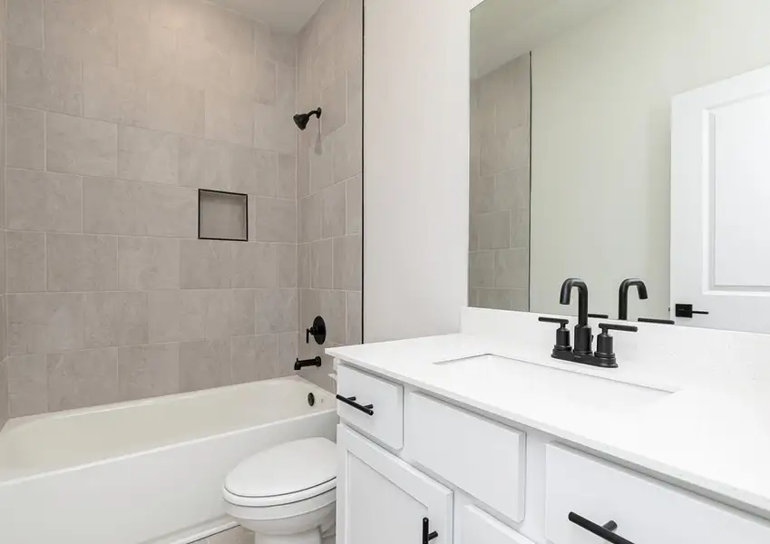 Representative furnished interior of a home built from the Davenport by LGI Homes in Mount Tabor Pointe, Dallas (Image 5).