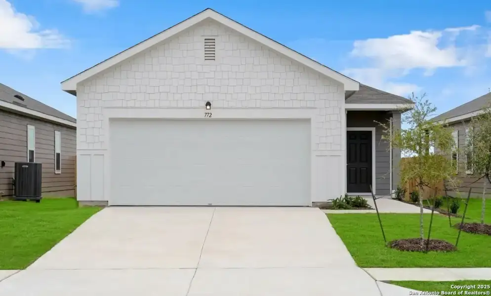 Front exterior of a new home in Trails at Culebra, San Antonio, TX, highlighting curb appeal (Image 2). Front exterior of a new home in Trails at Culebra, San Antonio, TX, highlighting curb appeal (Image 2).