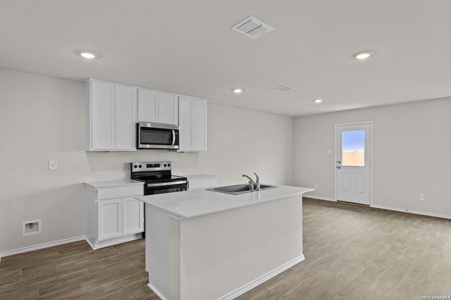 Furnished interior view inside a new home in Swenson Heights, Seguin (Image 6).