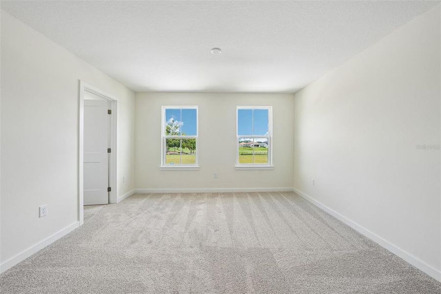 Spacious, unfurnished interior of a new home in Grasslands West, Lakeland (Image 19).