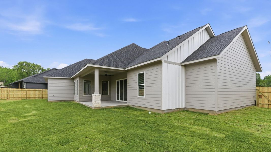 Exterior details and patio area of a home in , New Waverly (Image 4).