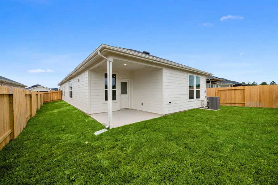 Exterior details and patio area of a home in Montgomery Bend, Montgomery (Image 4).