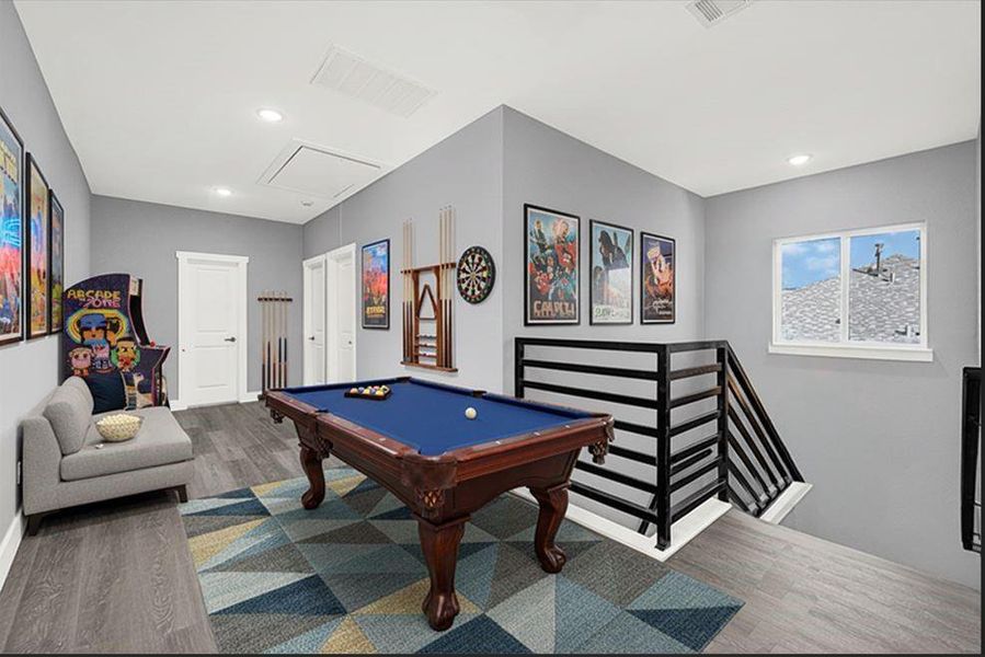 staged picture of the gameroom/media room