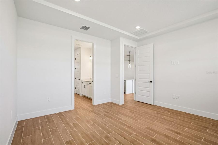 Spacious, unfurnished interior of a new home in Magnolia Bay - Reserve Series, Nokomis (Image 27).