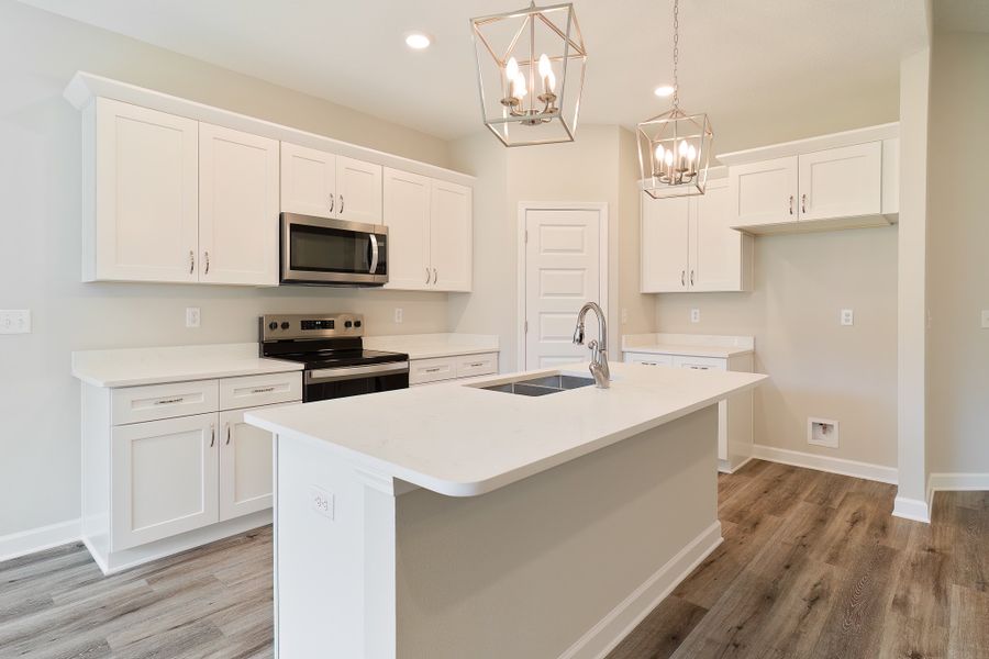 Representative furnished interior of a home built from the Maybell III by CJL Homes in McCarthy Estates, Defuniak Springs (Image 8).