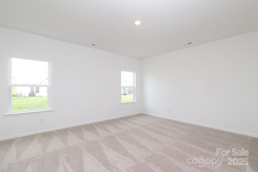 Spacious, unfurnished interior of a new home in Estates at Sugar Creek, Indian Land (Image 26).