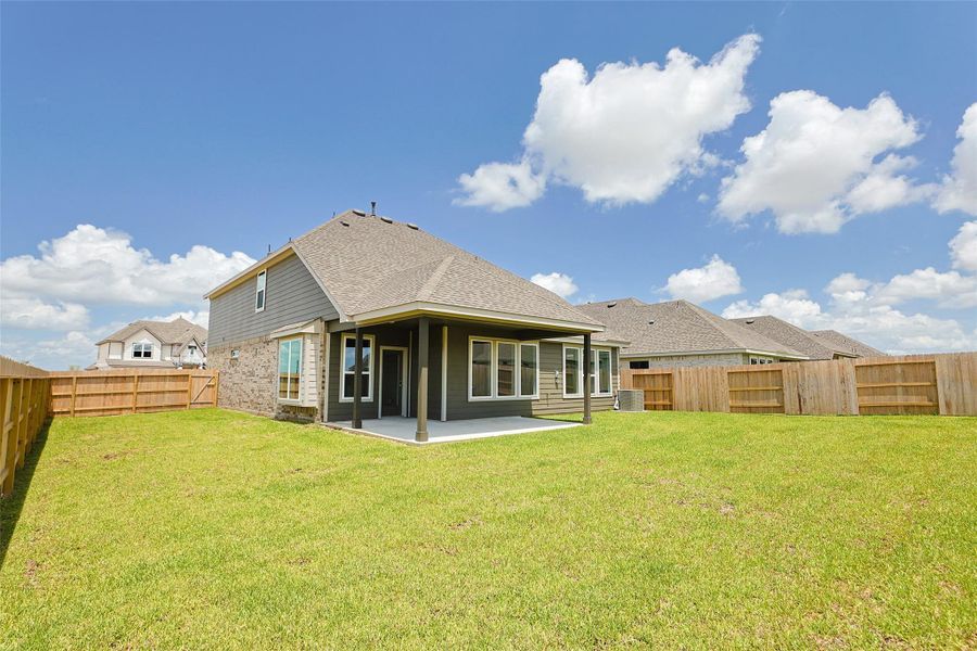 Exterior details and patio area of a home in Azalea, Pattison (Image 3).