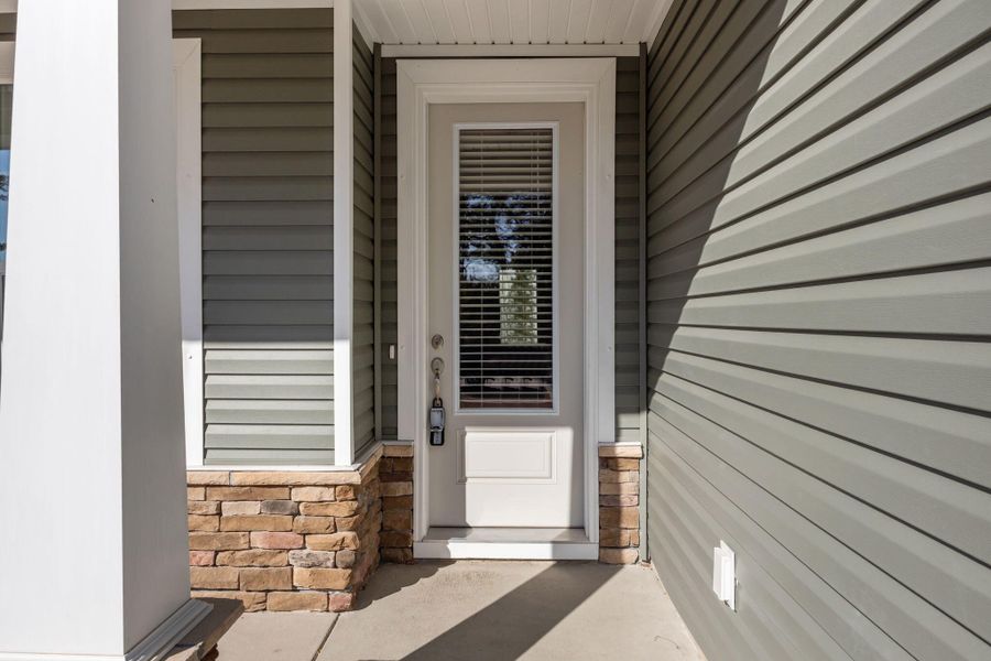 Exterior details and patio area of a home in The Groves of Berkeley, Moncks Corner (Image 34).