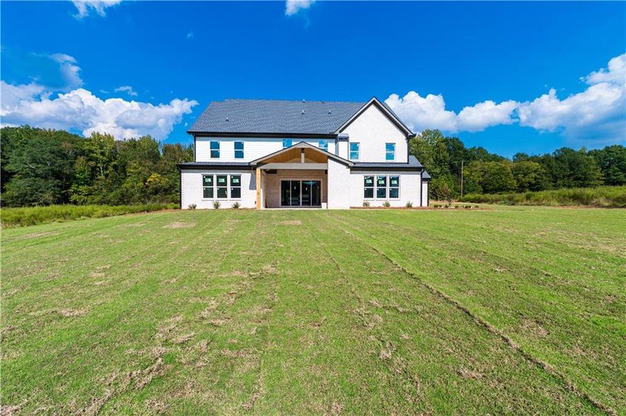 Exterior details and patio area of a home in , Dacula (Image 1).