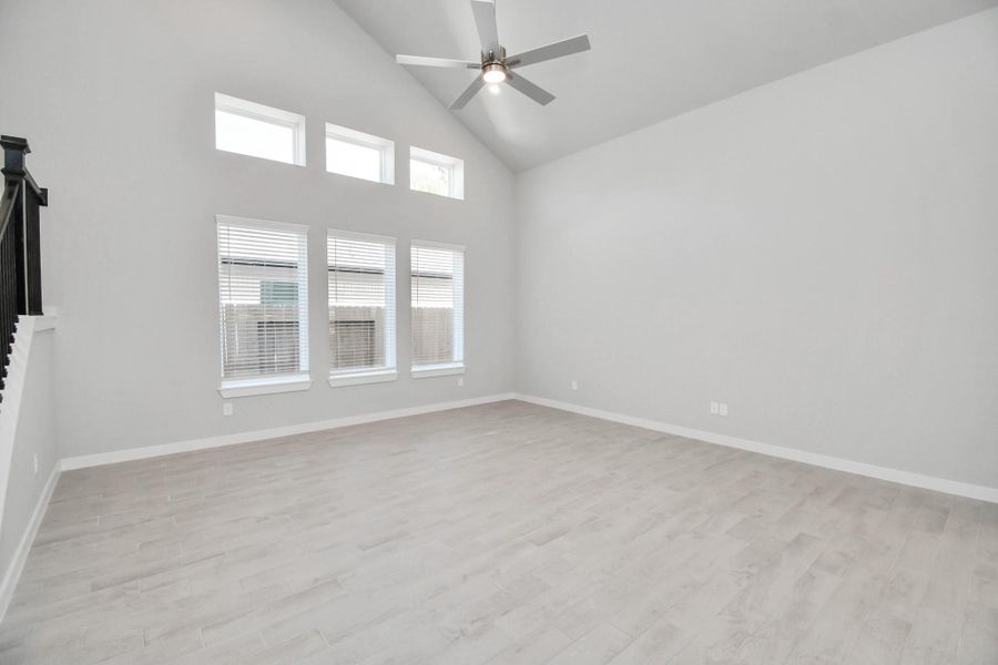 Take another glimpse into the heart of the home with this additional view of the family room—a sprawling space ready to accommodate all your gatherings. Sample photo of completed home with similar floor plan. Actual colors and selections may vary. Take another glimpse into the heart of the home with this additional view of the family room—a sprawling space ready to accommodate all your gatherings. Sample photo of completed home with similar floor plan. Actual colors and selections may vary.