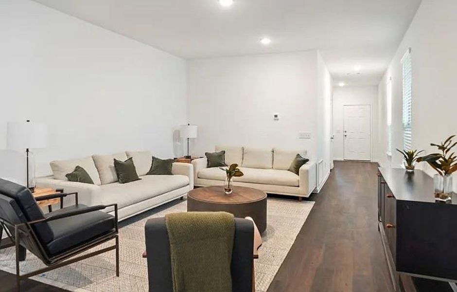 Furnished interior view inside a new home in The Pines At Seven Coves, Conroe (Image 3).
