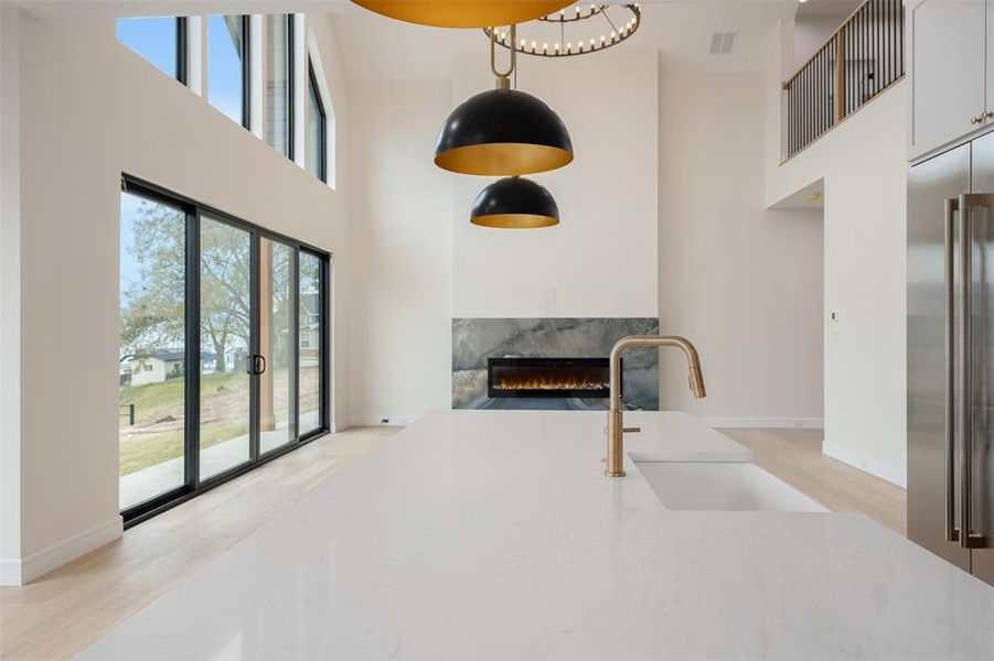 Open Floor Plan. Marble Surround Fireplace