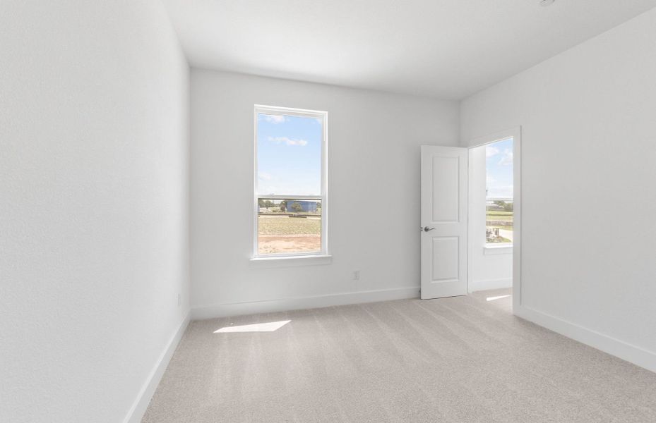 Spacious, unfurnished interior of a new home in Northpoint at Old Settlers, Round Rock (Image 26).