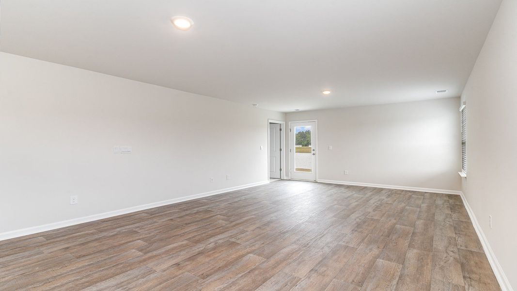 Representative unfurnished interior of a home built from the CAMERON by D.R. Horton in The Reserve at Wild Horse, Conway (Image 5).