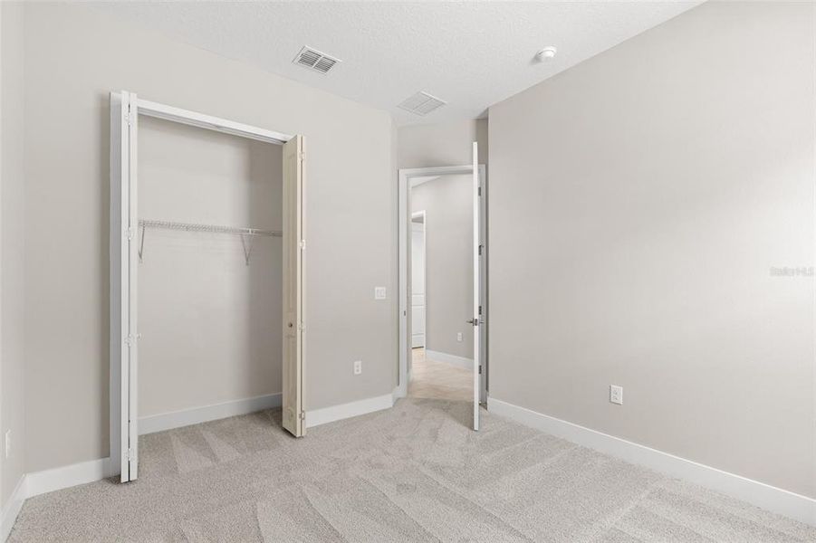 Spacious, unfurnished interior of a new home in Gray Hawk at Hole Two, Daytona Beach (Image 37).