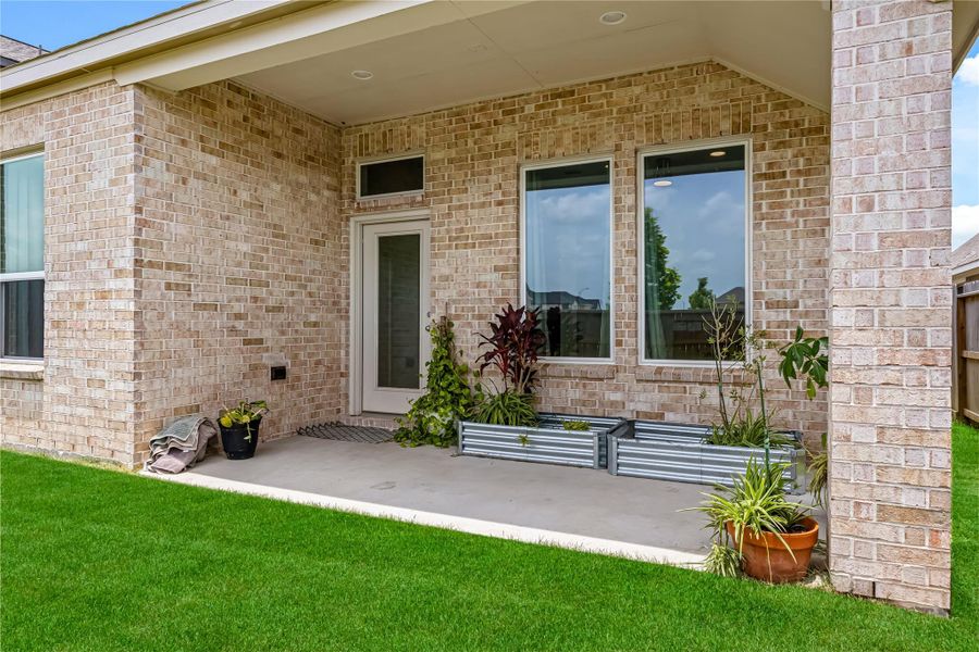 Exterior details and patio area of a home in , Richmond (Image 4). Exterior details and patio area of a home in , Richmond (Image 4).