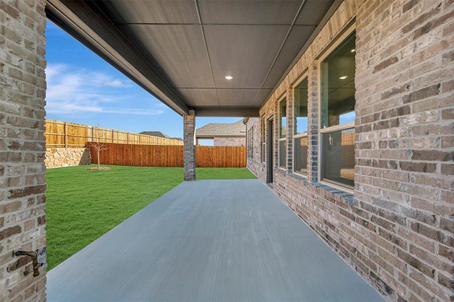 Exterior details and patio area of a home in Sagebrook, Argyle (Image 24).