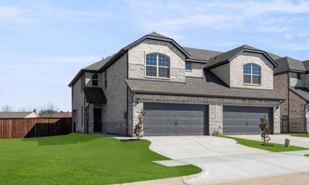 Representative exterior photo of a completed home built from the Granbury by Impression Homes in Main Street Village, Mansfield, TX (Image 2). Representative exterior photo of a completed home built from the Granbury by Impression Homes in Main Street Village, Mansfield, TX (Image 2).