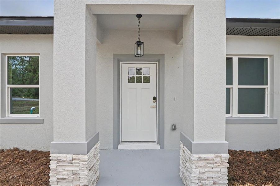 Exterior details and patio area of a home in , Citrus Springs (Image 22).