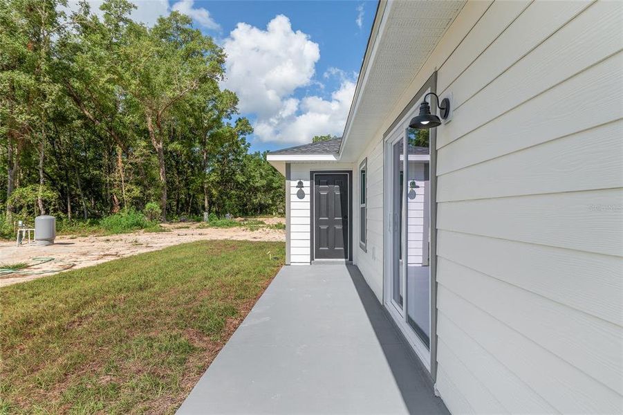 Front exterior of a new home in , Dunnellon, FL, highlighting curb appeal (Image 34).