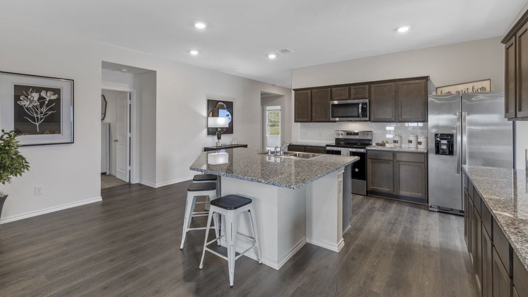 Furnished interior view inside a new home in Crane Crossing, Crandall (Image 6).