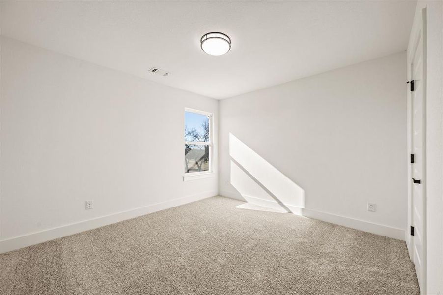 Spacious, unfurnished interior of a new home in The Resort on Eagle Mt. Lake, Fort Worth (Image 32).