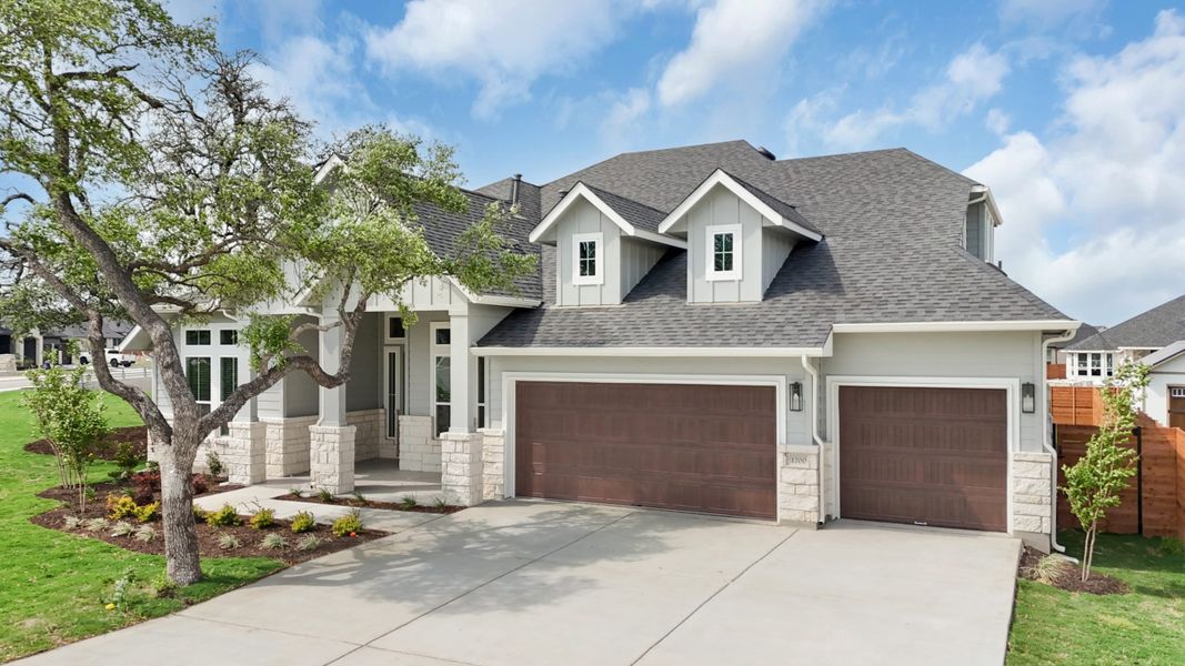 Front exterior of a new home in Broken Oak, Georgetown, TX, highlighting curb appeal (Image 27). Front exterior of a new home in Broken Oak, Georgetown, TX, highlighting curb appeal (Image 27).
