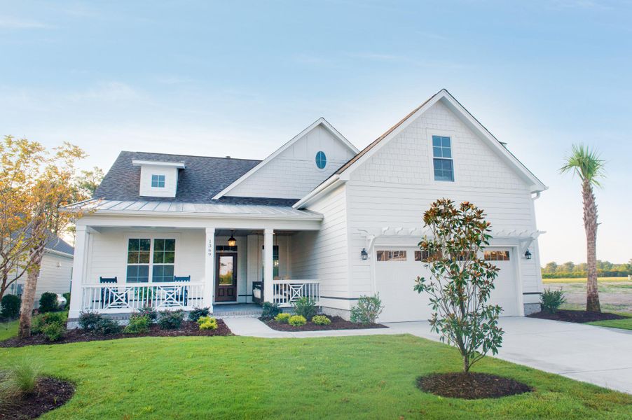 Representative exterior photo of a completed home built from the Ashton by Bill Clark Homes in Osprey Landing, Southport, NC (Image 22). Representative exterior photo of a completed home built from the Ashton by Bill Clark Homes in Osprey Landing, Southport, NC (Image 22).