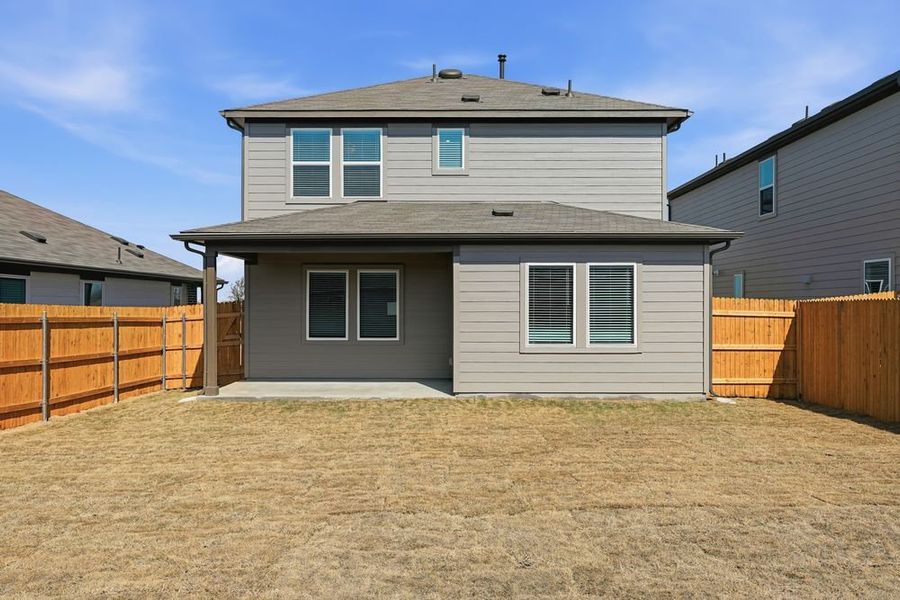Exterior details and patio area of a home in Longview, Del Valle (Image 15).