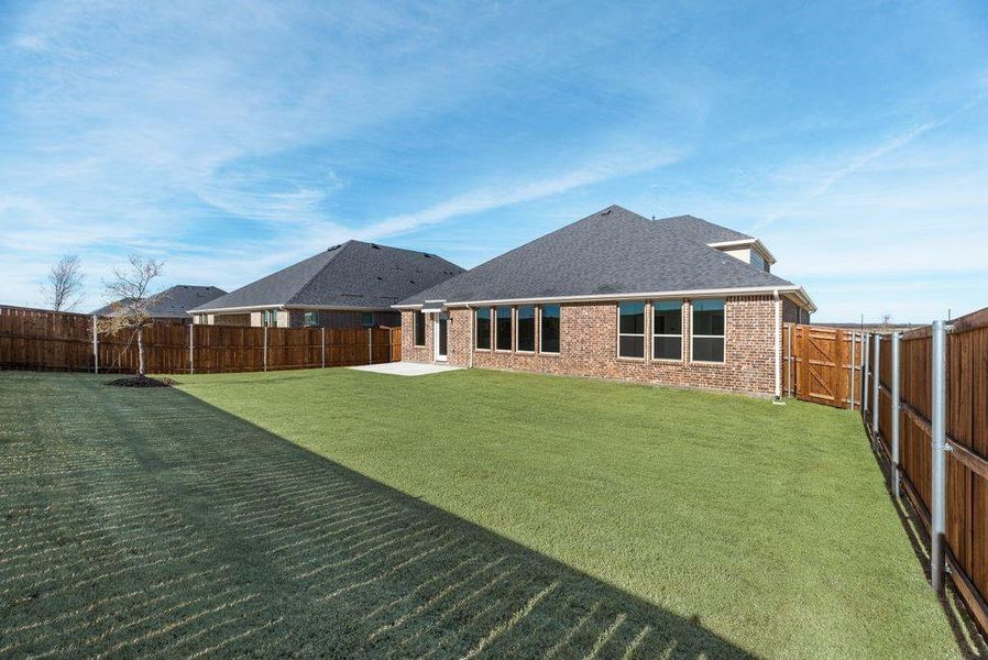 Exterior details and patio area of a home in Arbors at Legacy Hills, Celina (Image 4).
