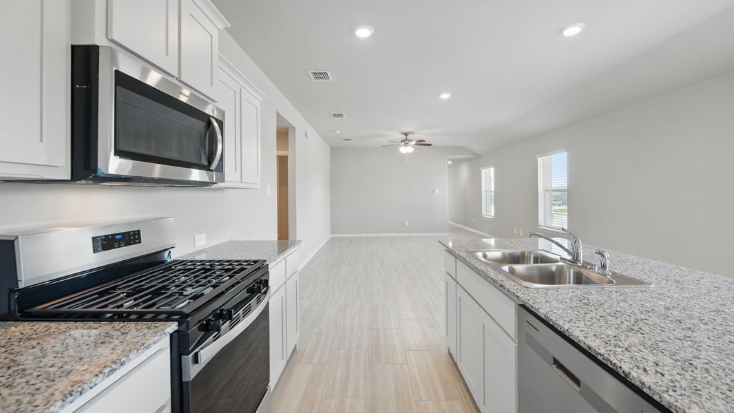 Furnished interior view inside a new home in Monarch at the Meadows, Ponder (Image 5).