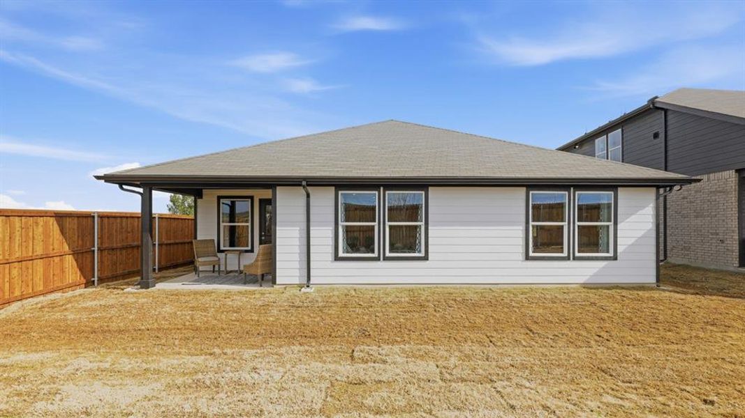 Exterior details and patio area of a home in Longhorn Estates, Fort Worth (Image 3).