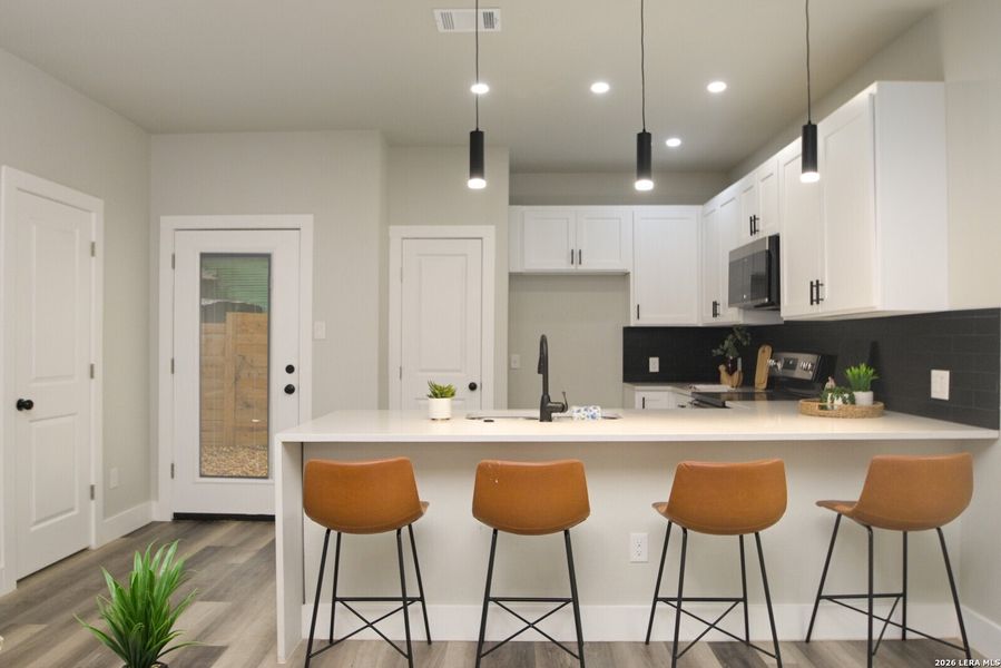 Furnished interior view inside a new home in , San Antonio (Image 34).