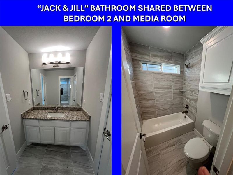 Modern bathroom featuring a single vanity with a granite-style countertop, undermount sink, and contemporary light fixture Modern bathroom featuring a single vanity with a granite-style countertop, undermount sink, and contemporary light fixture