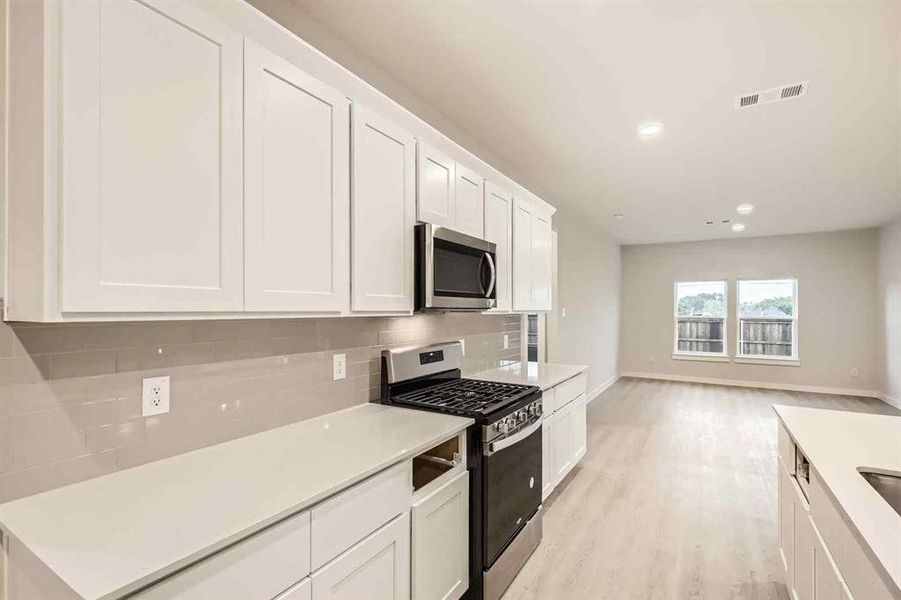 Furnished interior view inside a new home in Prestige Collection at Overland Grove, Forney (Image 6).