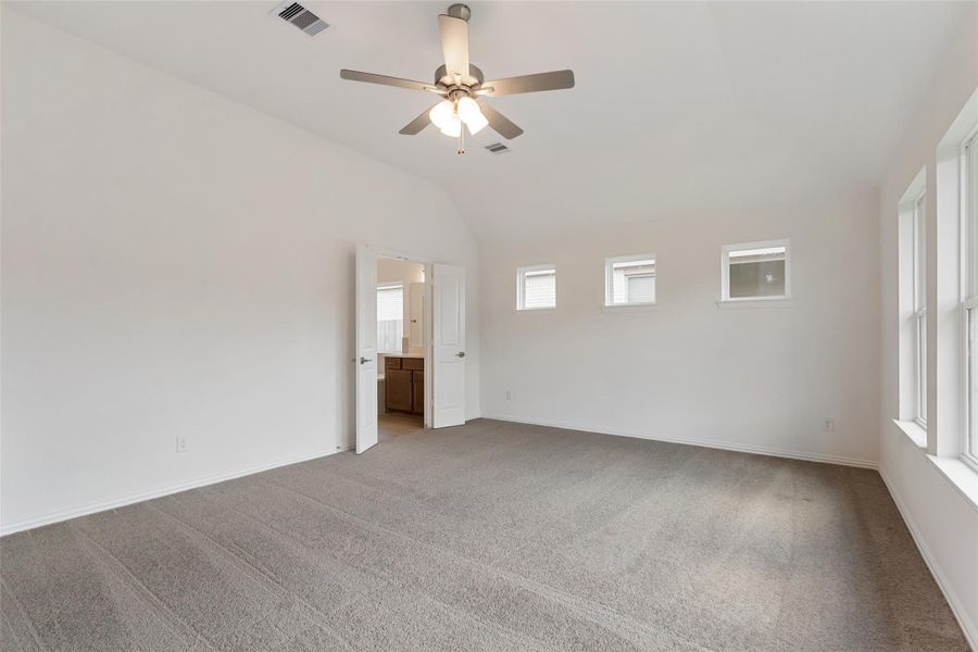 Spacious, unfurnished interior of a new home in Sunterra, Katy (Image 20).