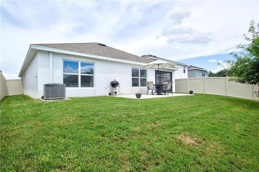 Exterior details and patio area of a home in , Zephyrhills (Image 26).